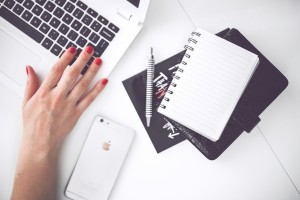 woman-smartphone-desk-highres